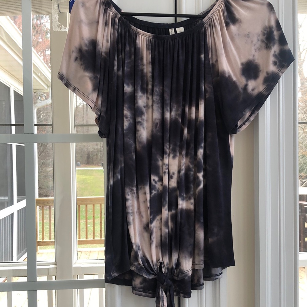 Tie dyed blouse ties at the bottom